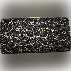 Sparkly black clutch